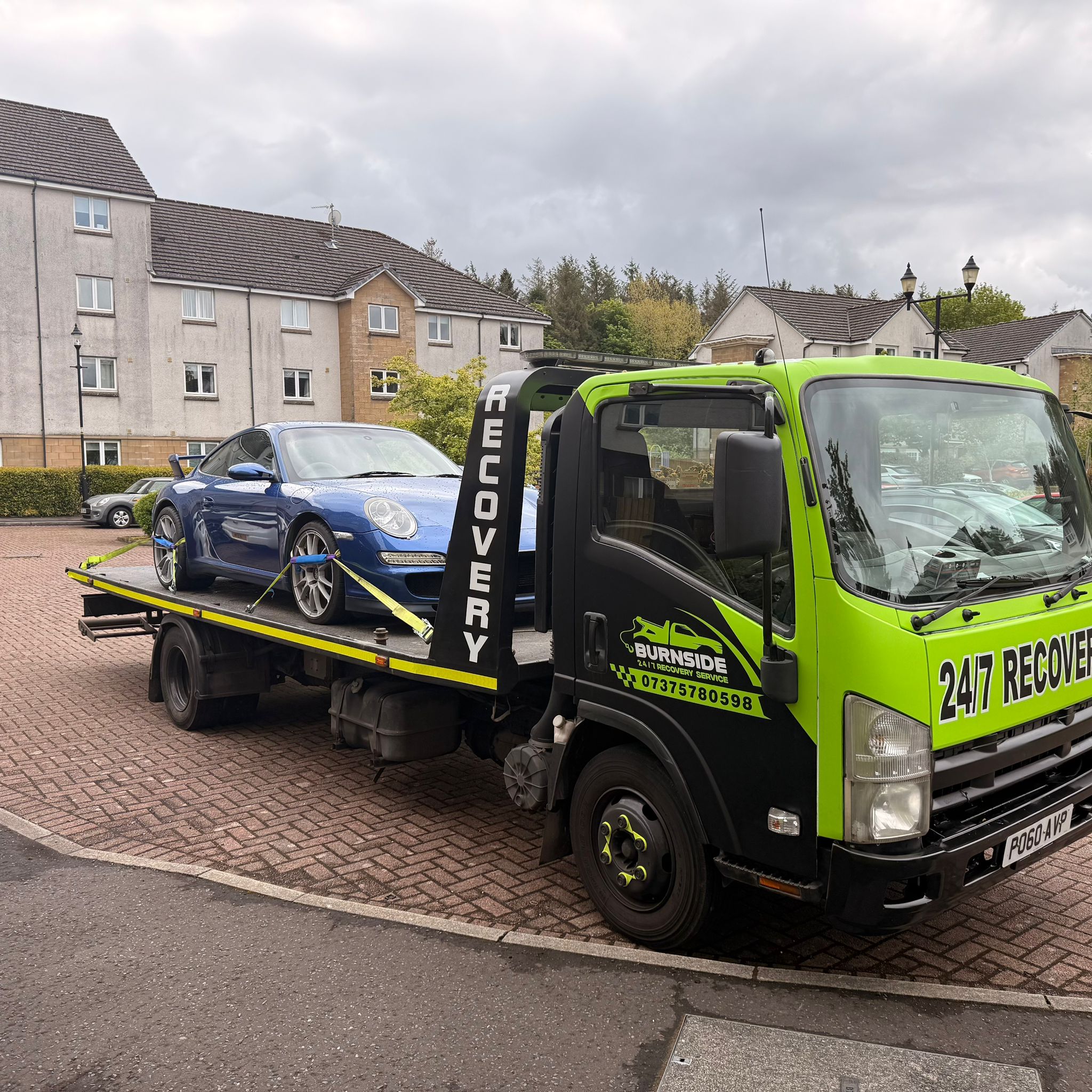 Burnside 24/7 recovery truck with a vehicle loaded